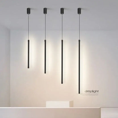 Four sleek black nordic led cylindrical pendant lights with minimalist design for kitchen and dining room decorbites black nordic