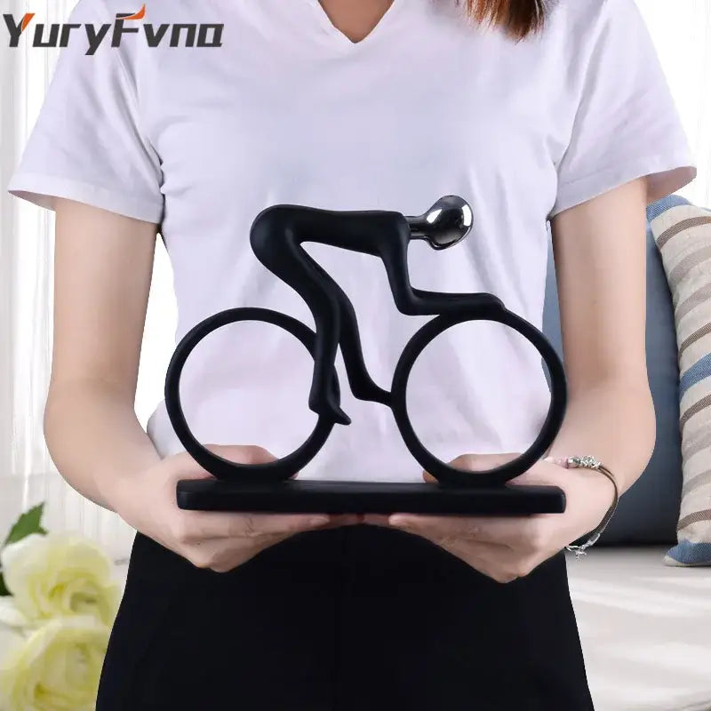 Minimalist black and silver decorbites cyclist sculpture figurine with glossy metallic head on matching base for living room decor