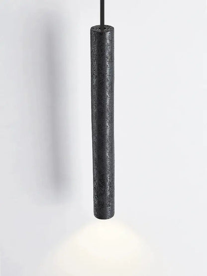 Minimalist black stone tube led pendant light with textured matte finish for bedroom lighting decorbites black stone