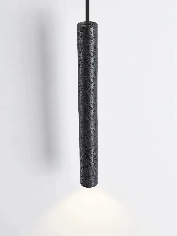 Minimalist black stone tube led pendant light with textured matte finish for bedroom lighting decorbites black stone