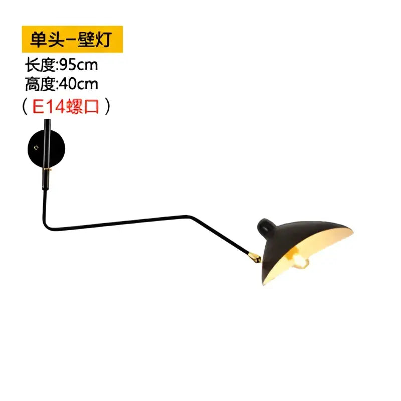Minimalist black metal wall lamp with two curved arms and conical gold interior shades for bedroom decorbites dawn spider