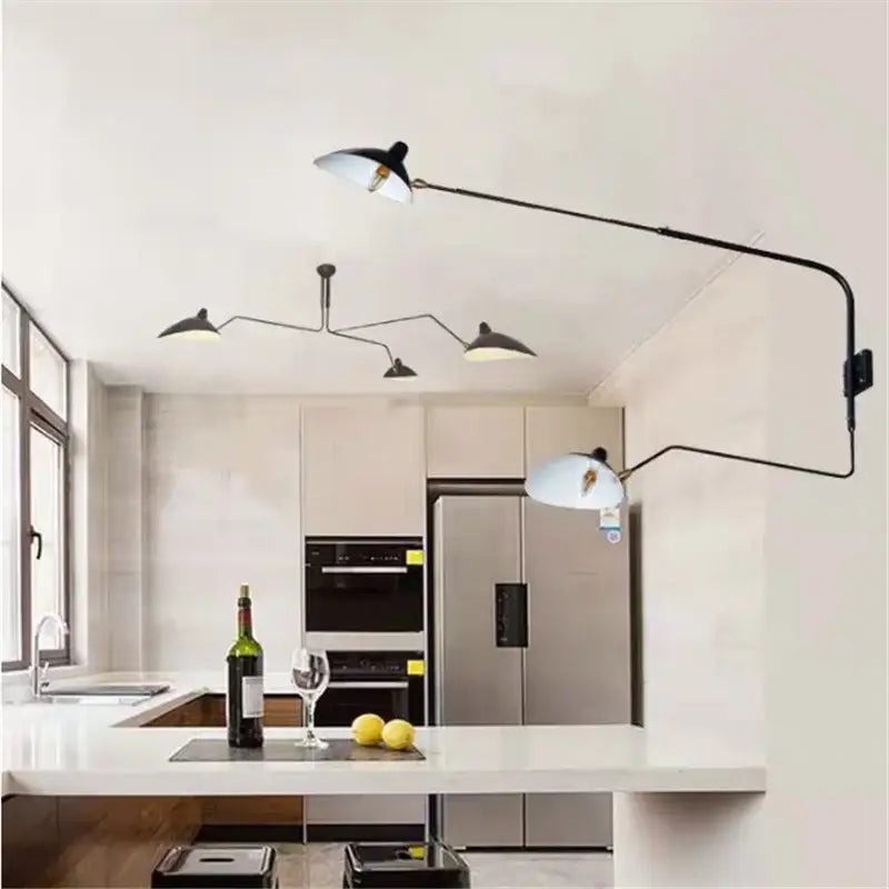 Minimalist black and white wall lamp with slender metal arms for bedroom decor featuring decorbites dawn spider design