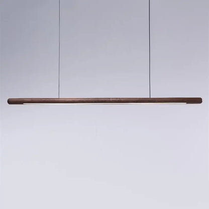 Minimalist black walnut wood pendant lights with sleek cylindrical body suspended by thin black cords for dining room decorbites black walnut