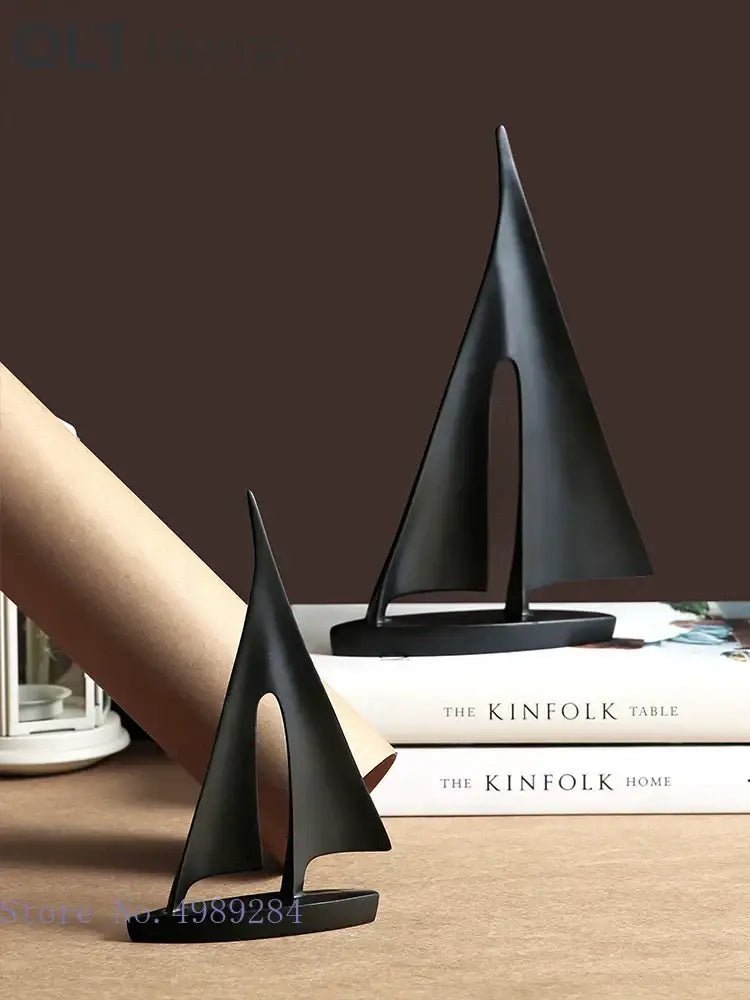 Minimalist black matte abstract resin sailboat figurine with sleek design for living room decorbites abstract resin decor