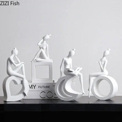 Set of four minimalist white resin abstract resin sculpture figurines depicting stylized women by decorbites for living room decor