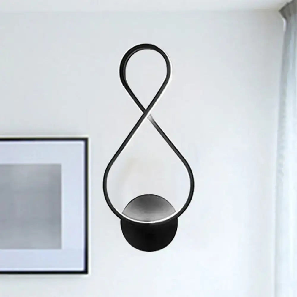 Black infinity-shaped acrylic led wall lamp with minimalist design and circular base for bedroom sconce in black and white