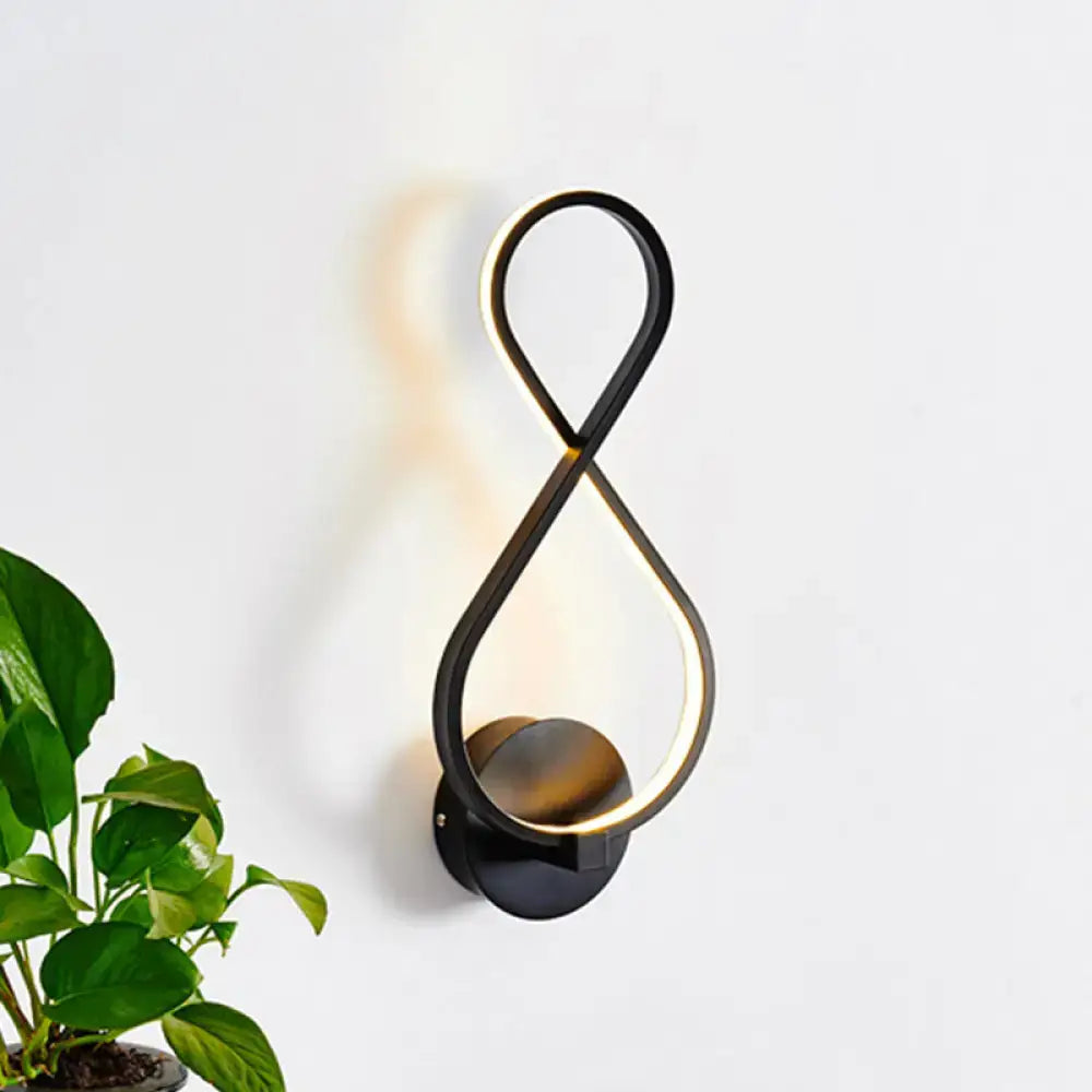 Black infinity-shaped acrylic led wall lamp with sleek modern design and warm ambient lighting for bedroom sconce