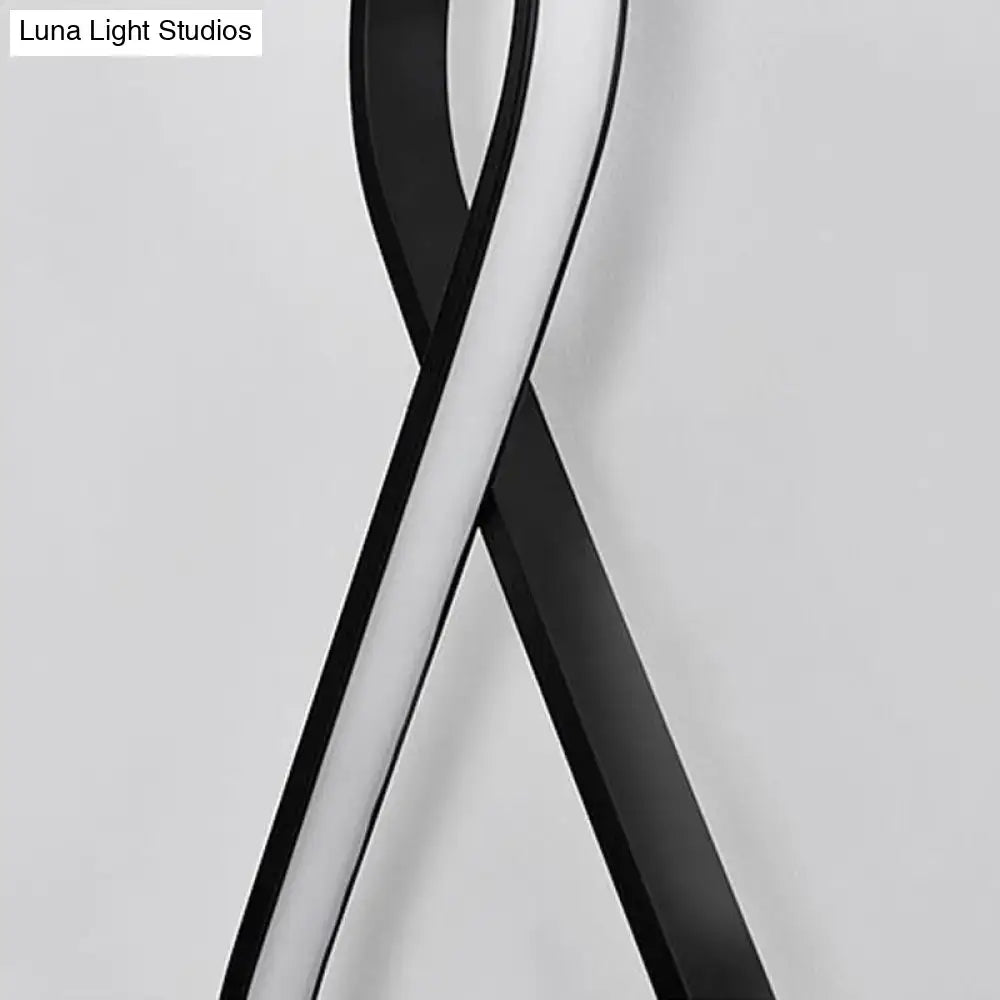 Modern minimalist wall lamp with sleek black and white twisted acrylic led design for bedroom sconce lighting