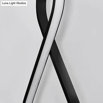 Modern minimalist wall lamp with sleek black and white twisted acrylic led design for bedroom sconce lighting