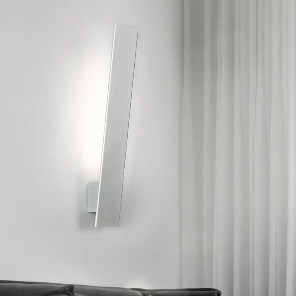 Minimalist white rectangular direct wired wall sconce with aluminum shade and sleek modern design for bedroom use