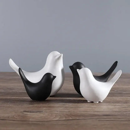 Minimalist black and white ceramic bird figurine set with smooth glossy finish for living room decor