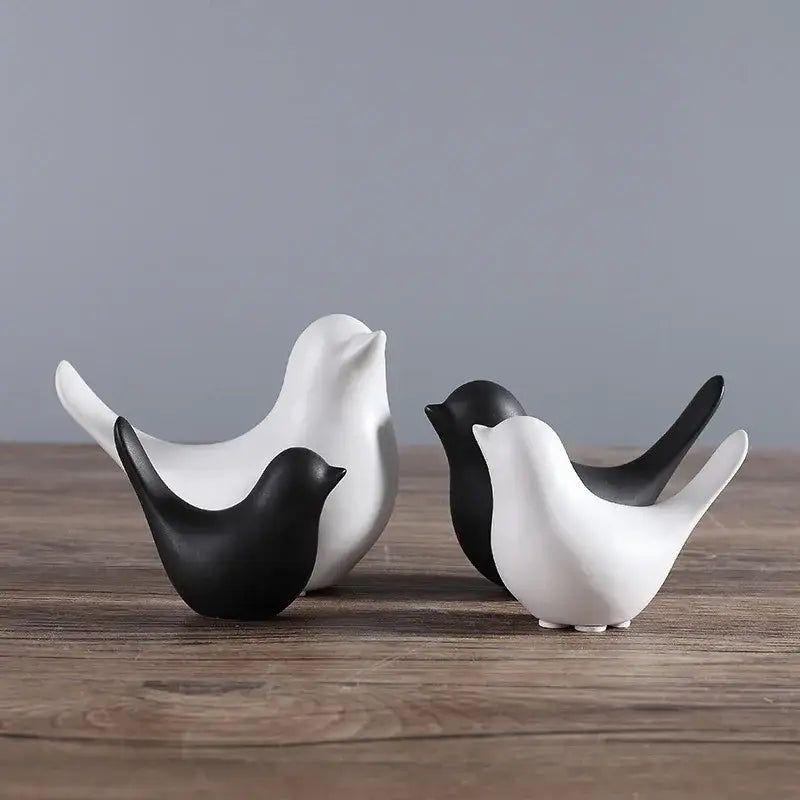 Minimalist black and white ceramic bird figurine set with smooth glossy finish for living room decor
