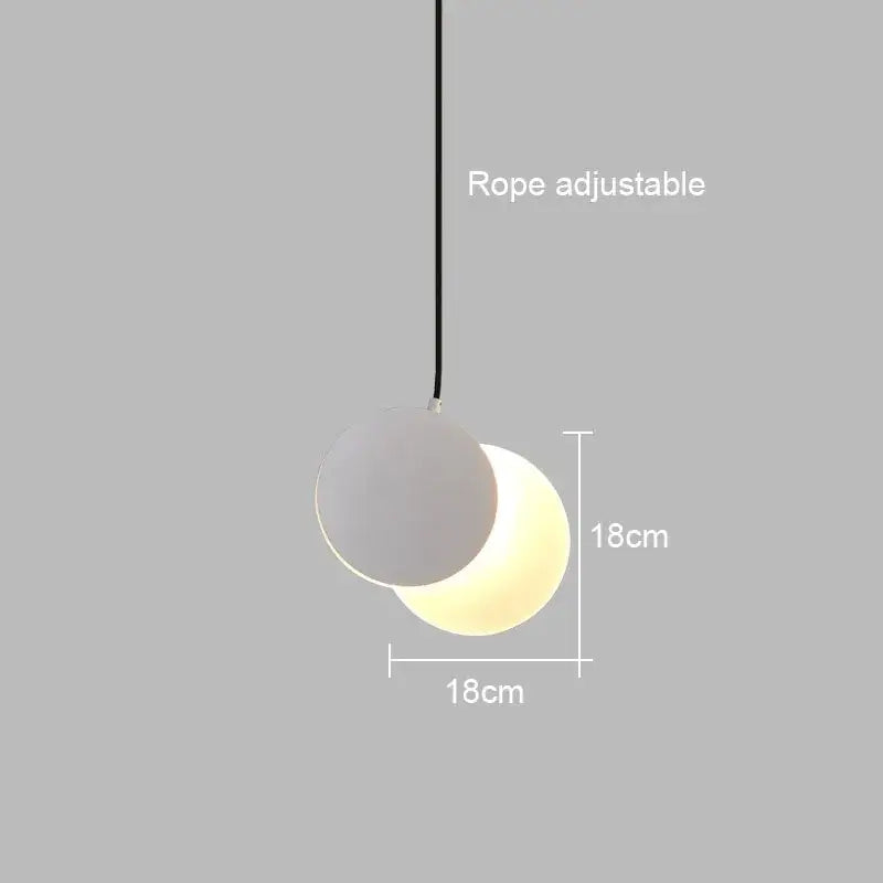 Minimalist black and white crescent moon pendant chandelier with two spherical shades hanging from black rope decorbites crescent moon