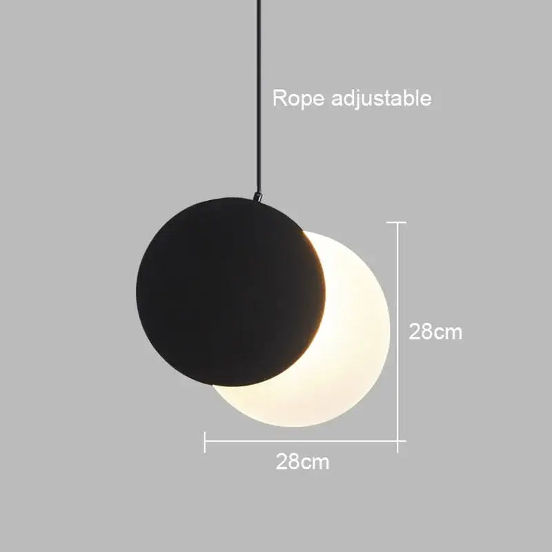 Minimalist black and white pendant chandelier with crescent moon design and adjustable rope hanging by decorbites crescent moon