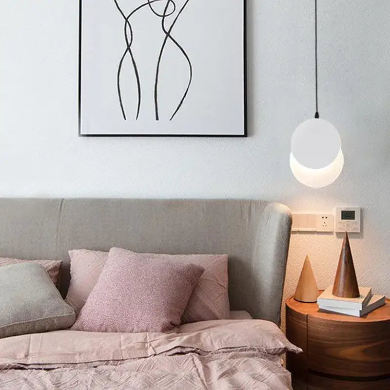 Minimalist black and white crescent moon pendant chandelier with a sleek white pendant light decorbites crescent moon bedroom light
