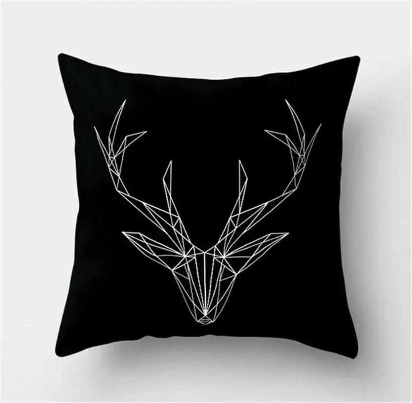 Black throw pillow with white geometric deer head design featuring black white flocking for living room decorbites
