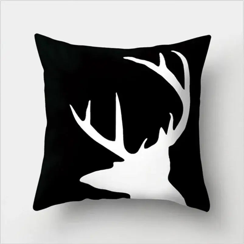 Black throw pillow with bold white deer antlers silhouette in decorbites black white flocking pillowcase design