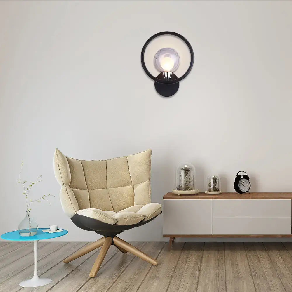 Minimalist black wall sconce with frosted glass ball shade and metallic accents for bedroom lighting 220v-240v 110v-120v