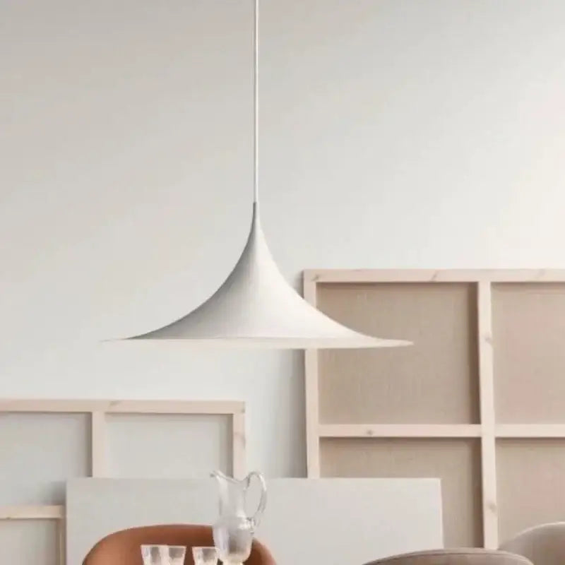 White conical minimalist pendant light with cord pendant installation ideal for black and white dining room color options