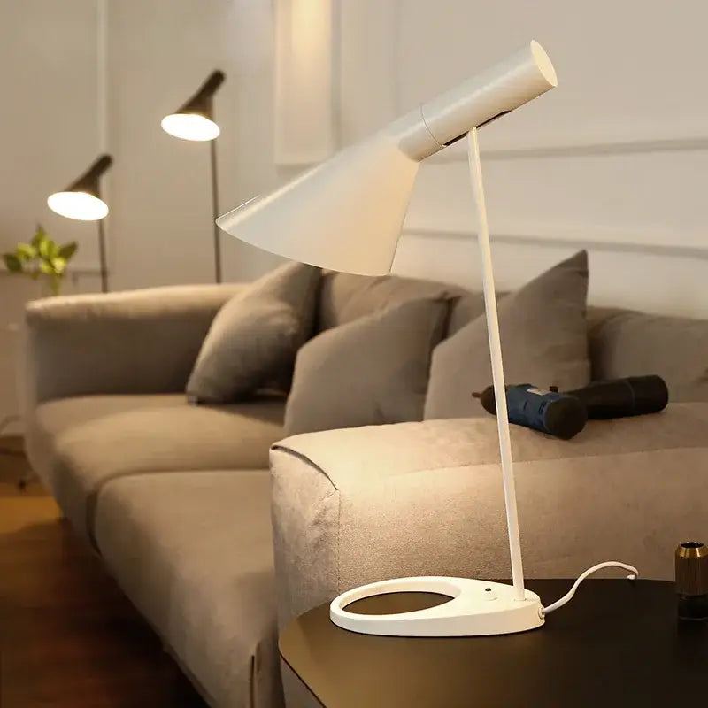 Minimalist black and white industrial iron table lamp with a sleek conical shade and slender stem for bedroom decorbites industrial iron table lamp