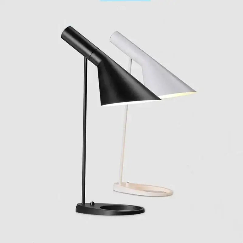 Minimalist black and white industrial iron table lamps with sleek conical shades and slender stems for bedroom use