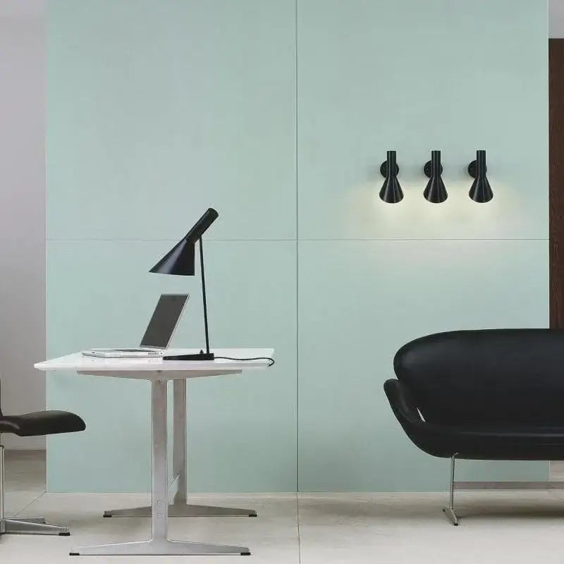 Minimalist black and white industrial iron table lamp with sleek angular design and matte finish for bedroom decorbites industrial iron table