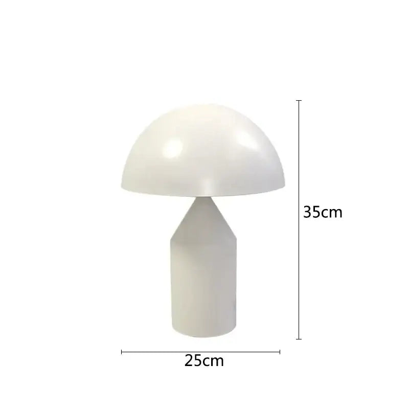 A sleek white decorbites iron mushroom table lamp with glossy finish and geometric base for minimalist bedroom lighting
