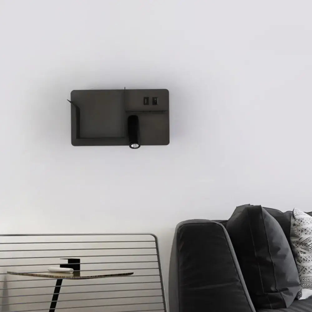 Minimalist black and white metal tubular wall light with matte black reading lamp and integrated usb ports for bedroom use