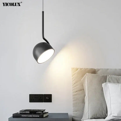 Minimalist black matte yicolux modern pendant light with sleek curved stem and warm light for dining room use