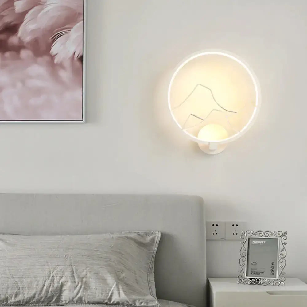 Minimalist black and white acrylic ring wall lamp with glowing frame and bird design for bedroom wall lamp use