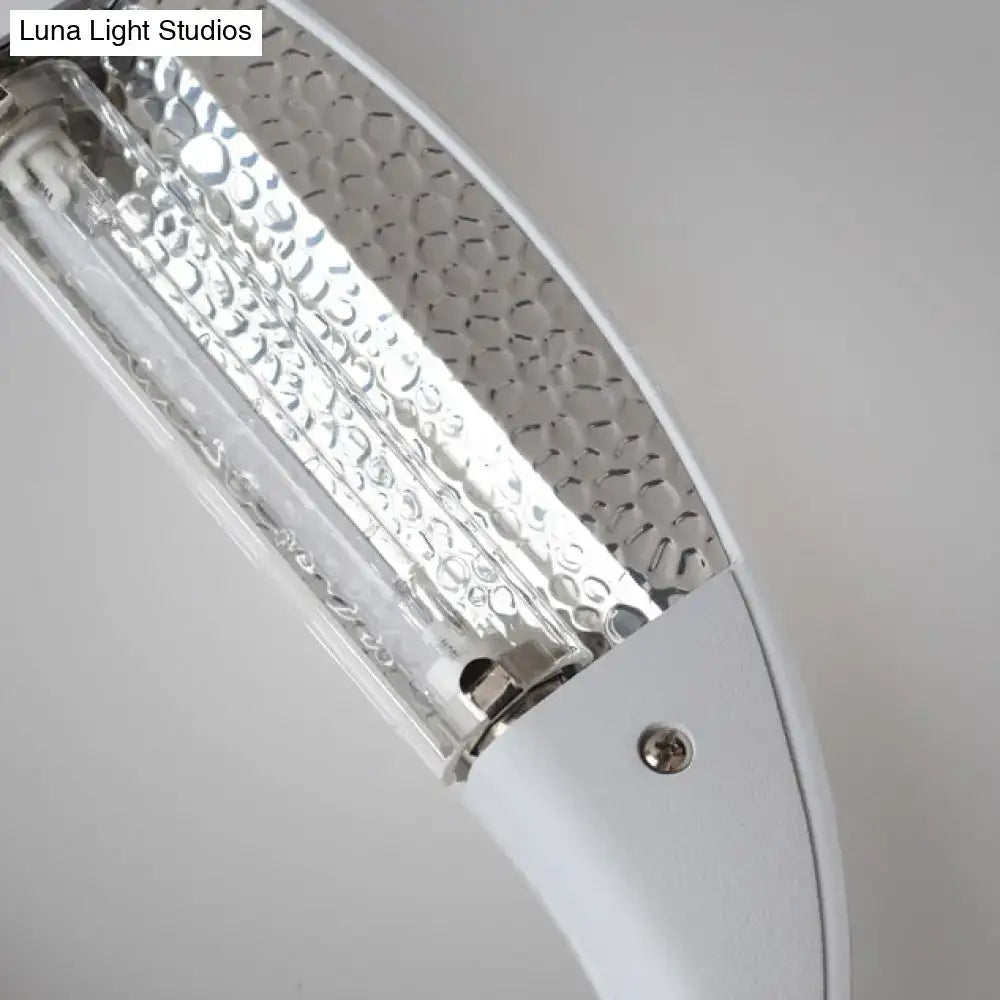 Minimalist black and white oval led wall sconce with white curved textured glass panel and metallic accents wall light with integrated led bulb