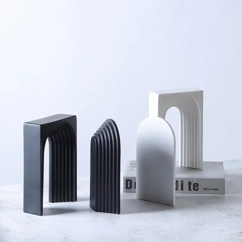 Set of three minimalist semicircular arch ceramic bookends in matte black white and gray for living room decorbites decor figurines