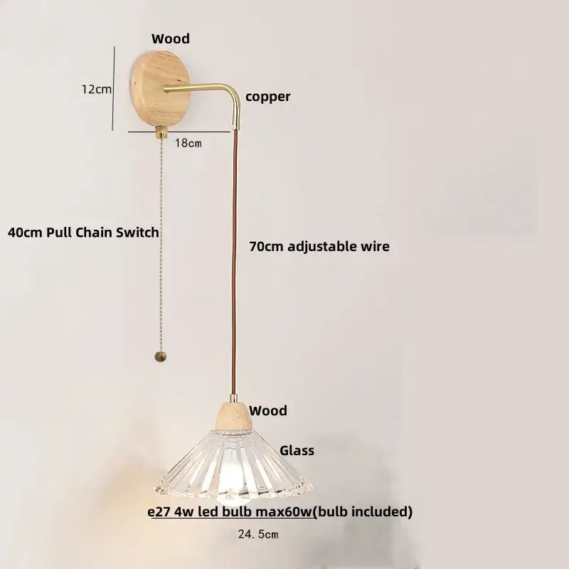 Minimalist brass wall light with clear glass fluted pendant and wooden accents for bedroom decorbites clear glass design