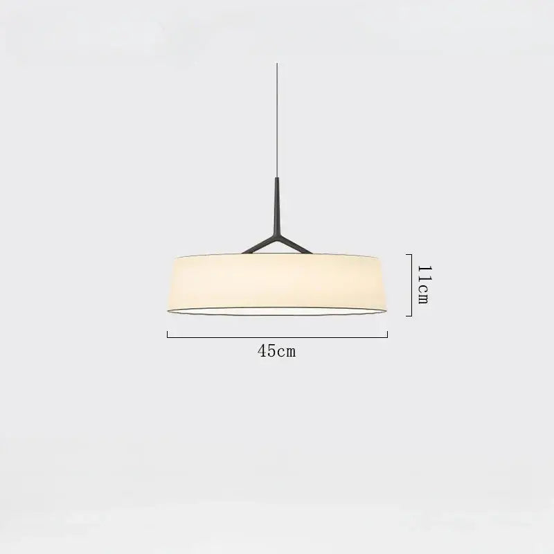 Minimalist dama pendant lamp with a sleek black metal frame and off-white fabric shade for modern kitchens