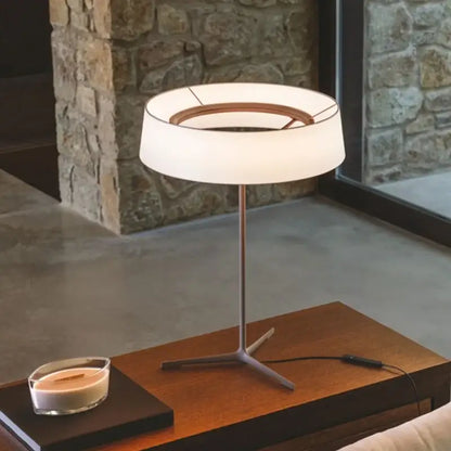 Minimalist dama pendant lamp with a white fabric shade and brass stand ideal for modern kitchen lighting