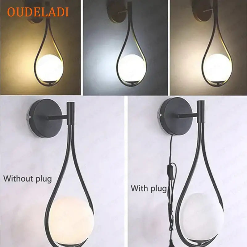 Minimalist brass glass ball wall sconce with black teardrop metal frame and frosted glass globe for living room decorbites brass glass