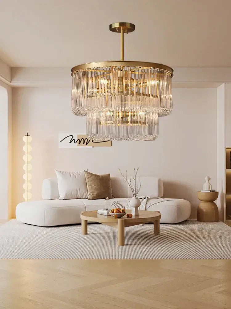 A modern glass bar chandelier with a gold brass glass bar frame and cascading crystal prisms for living room decorbites brass glass