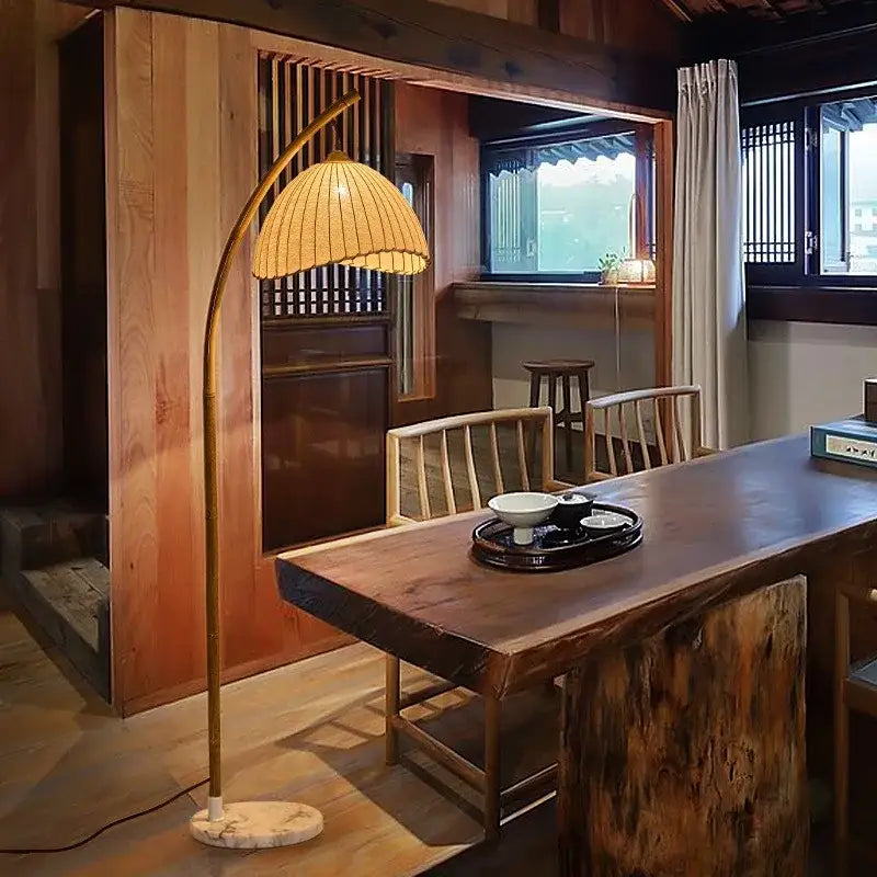 Minimalist golden arched led floor lamp with woven bamboo shade and marble base for living room lighting