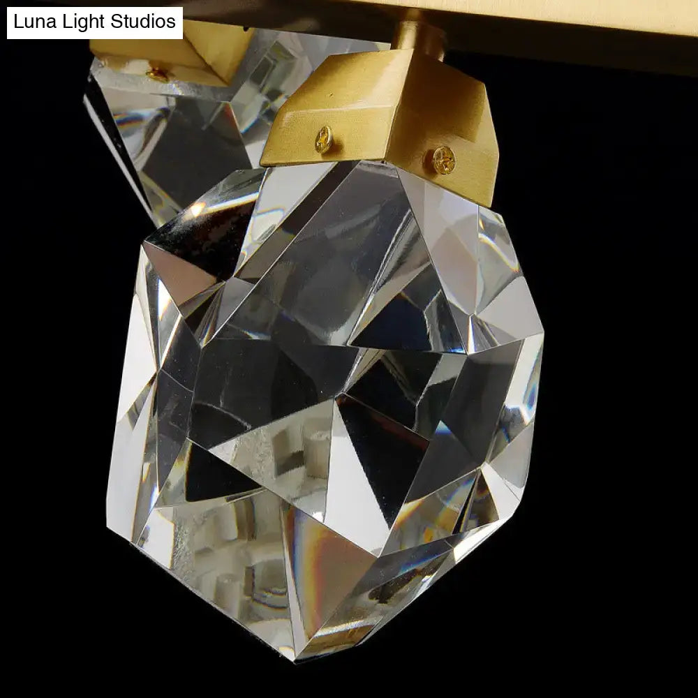 Clear faceted crystal pendant with gold-toned metal cap in minimalist brass led gemstone dining room ceiling light