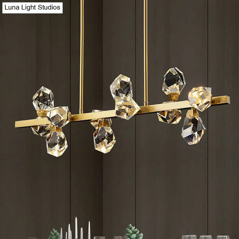 Gold-toned minimalist brass led gemstone dining room ceiling light with faceted crystal droplets on a sleek bar