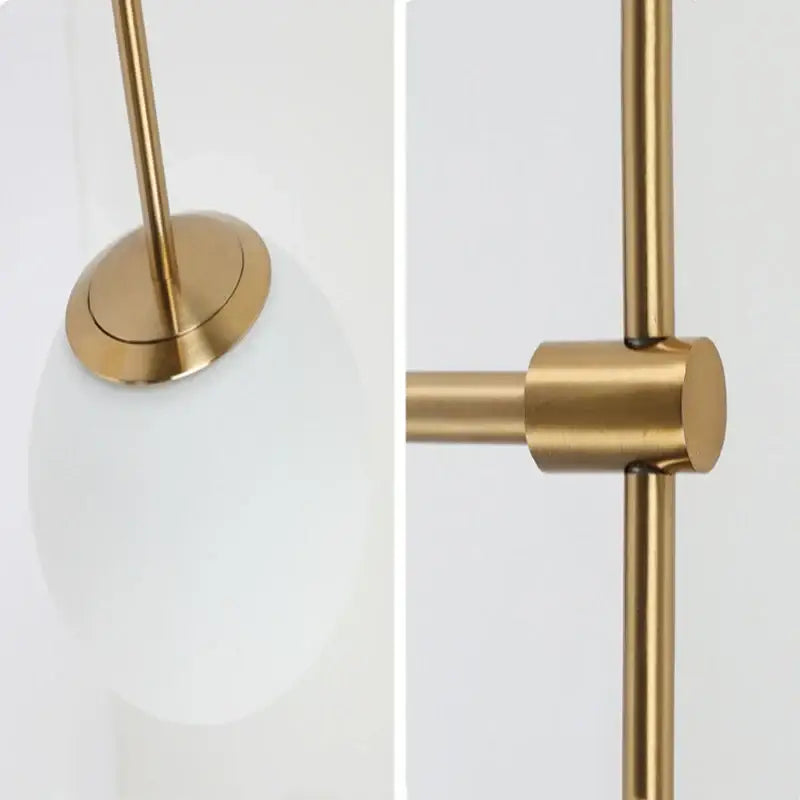 Minimalist gold-toned metal frame led wall lights with frosted white glass globe for bedroom lighting
