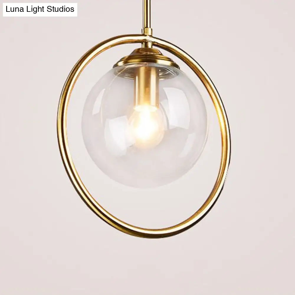 Minimalist Brass Plated Ball Drop Pendant Light with Clear Glass and Ring Decoration