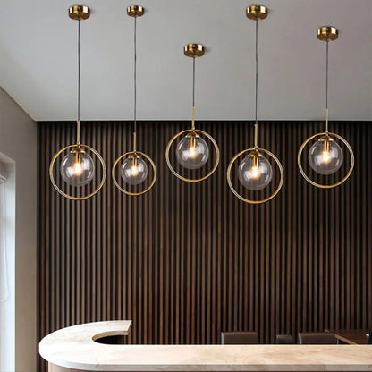 Minimalist Brass Plated Ball Drop Pendant Light with Clear Glass and Ring Decoration