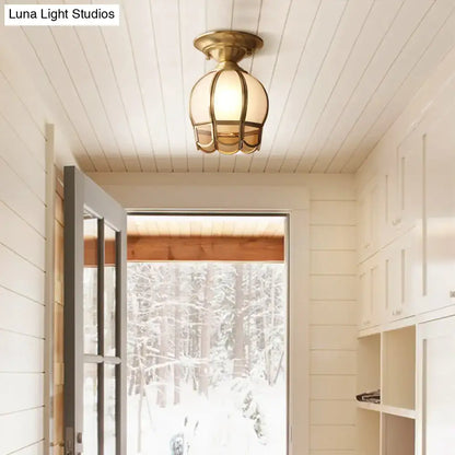 Decorbites minimalist brass flush mount ceiling light with frosted glass globe and scalloped metal single bulb flush design