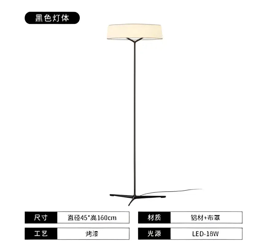 Black floor lamp with slender metallic frame and cream fabric shade minimalist bronze italian design for living room decorbites italian design