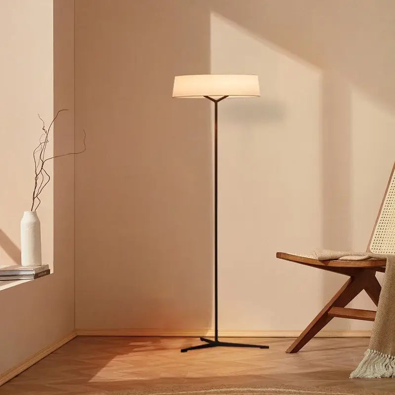 Modern black metal floor lamp with soft white fabric shade minimalist bronze italian design decorbites italian design for living room