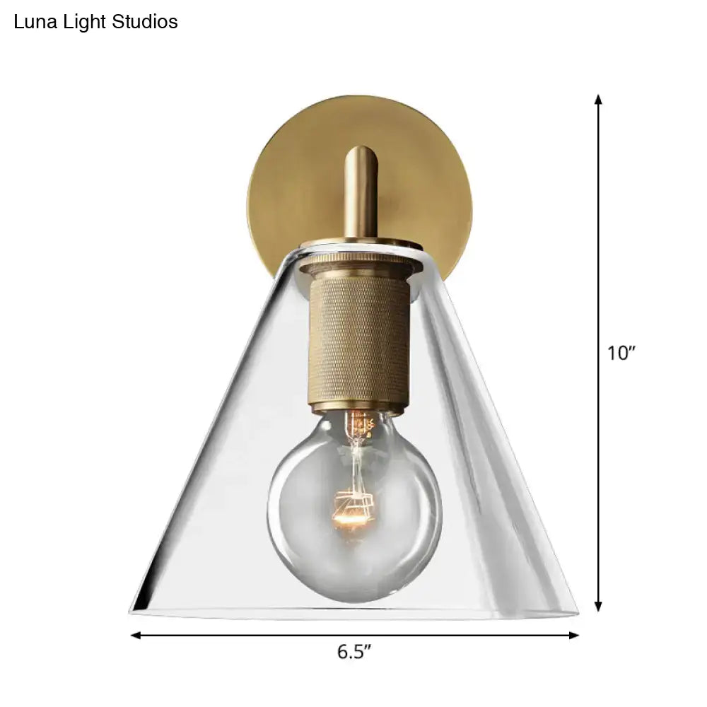 DecorBites™ minimalist bronze wall sconce with brass finish clear glass shade and exposed light bulb design