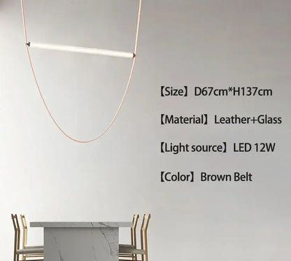 Minimalist brown leather pendant light with a sleek curved copper wire frame for bedroom decorbites belt decor