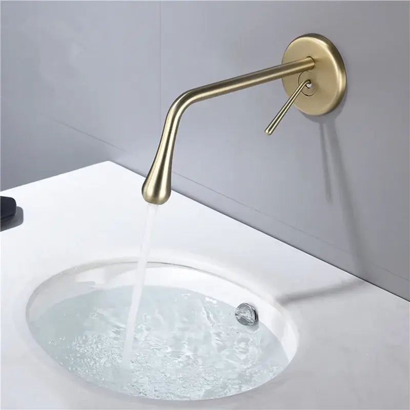 Minimalist brushed gold basin faucet with brass finish wall mounted tap featuring a sleek curved spout decorbites brushed gold