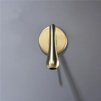 A minimalist brushed gold basin faucet wall mounted tap with a sleek teardrop design by decorbites brushed gold